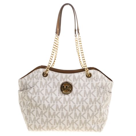 michael kors cream tan purse with chain|Michael Kors hand luggage.